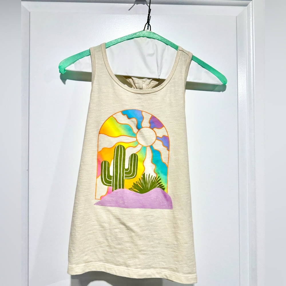 Girls, relaxed, fit, racer back with loop hole tie back. Like new. Size 10/12